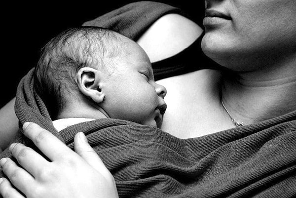 Black and white image of mother and baby