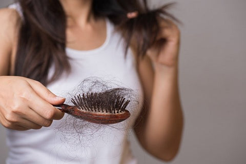 hair loss on a brush froma post pregnant woman