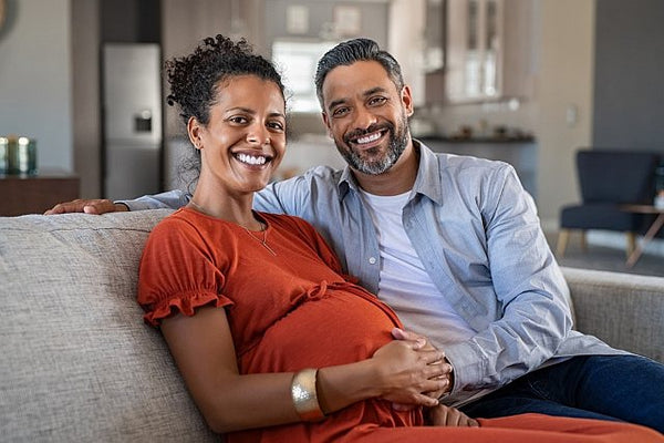 5. man and woman holding baby bump