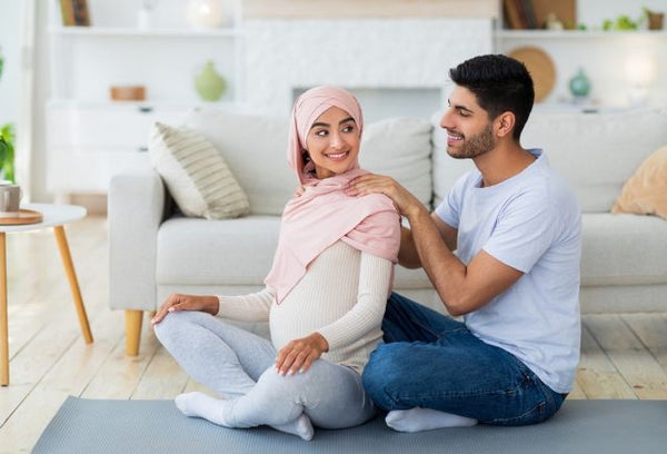 7. Man massages his partners shoulders