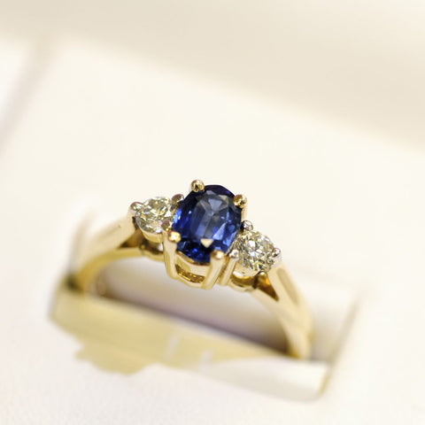 blue sapphire and diamond trilogy engagement ring