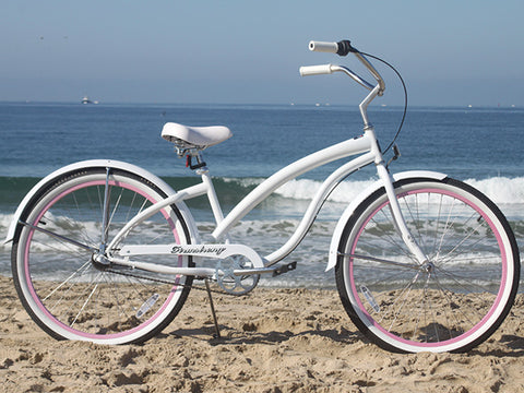 white beach cruiser with basket