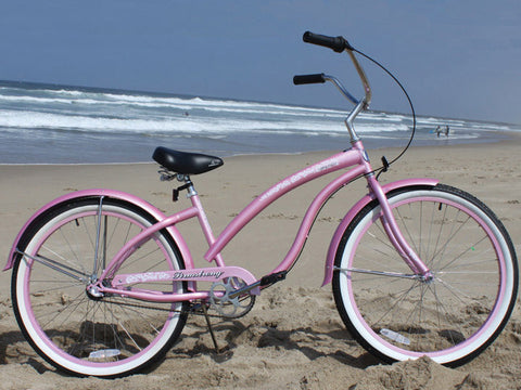 pink beach cruiser bike with basket