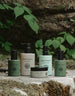 Lineup of 5 Fount Society products in nature