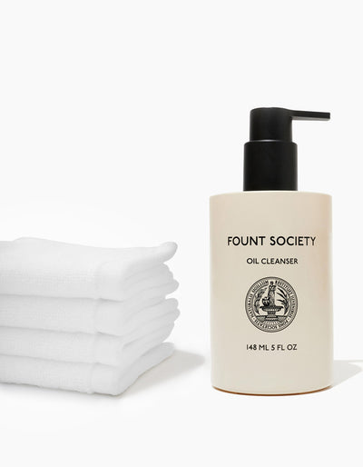 Fount Cleansing Cloths and Fount Oil Cleanser bottle.