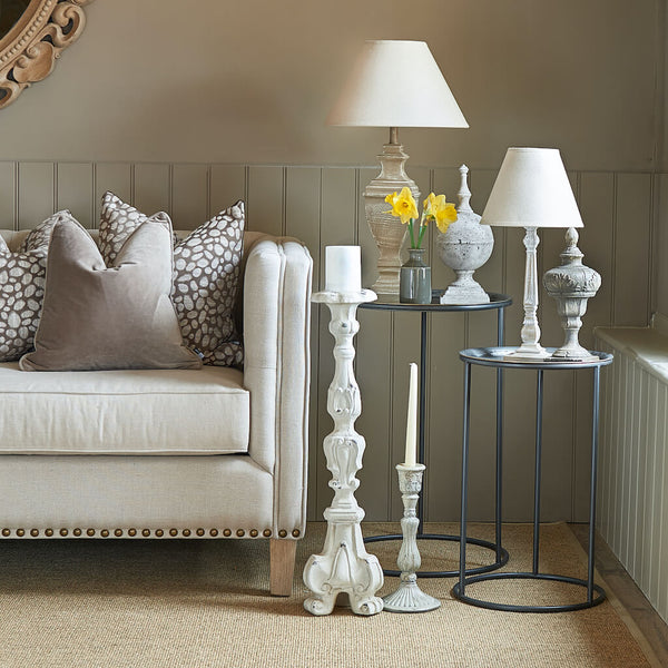 Taupe pebble cushions and mink velvet cushions on sofa