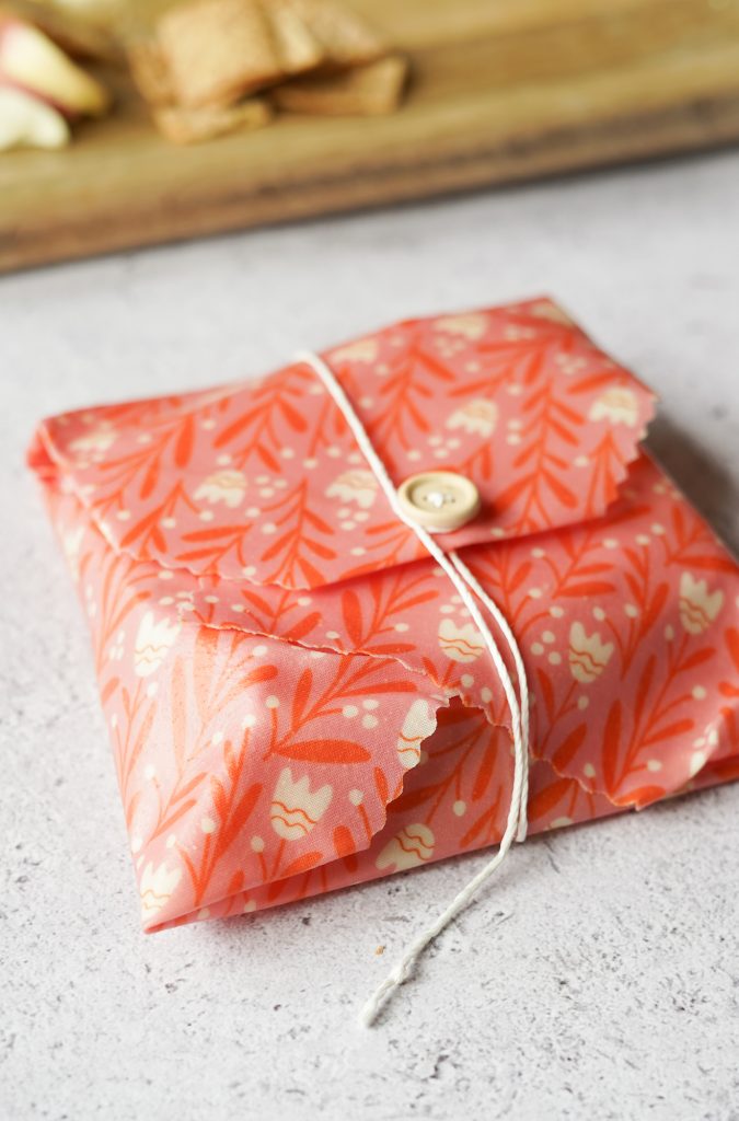 sandwich in beeswax wrap tied up