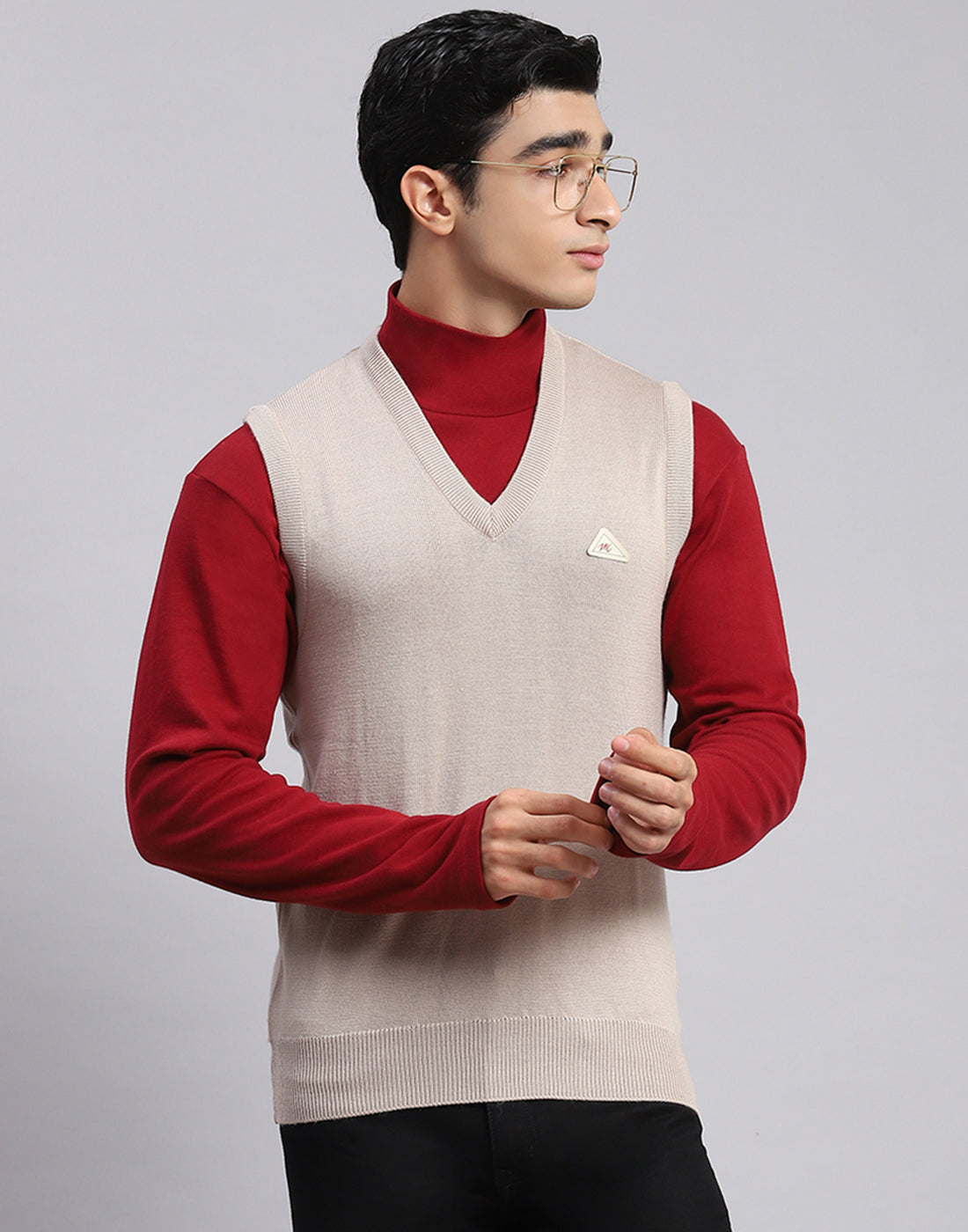 Buy Men Beige Solid V Neck Sleeveless Sweater Online in India