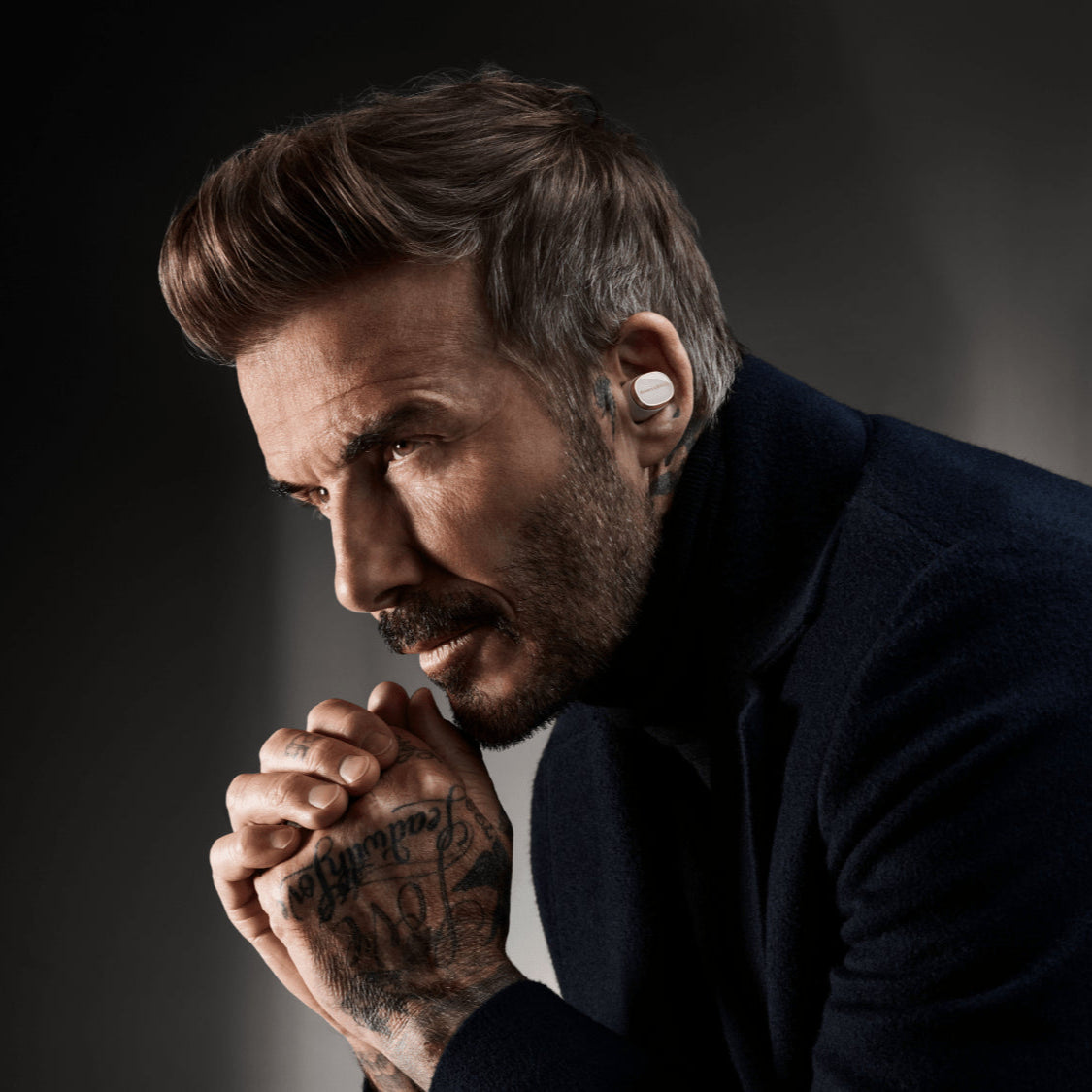 David Beckham Wearing the Bowers & Wilkins Pi8 wireless earbuds