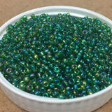 Transparent Emerald Rainbow 12/0 (547) - 24 gram tube
