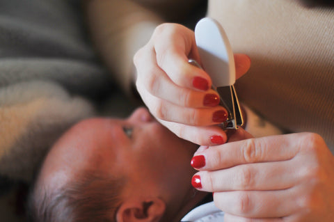 Close Up Of Mom Cutting Child's Nails. Mom Cutting New Born Baby Nails  Using Scissors, Looking After Her Infant. Stock Photo, Picture and Royalty  Free Image. Image 181882121.