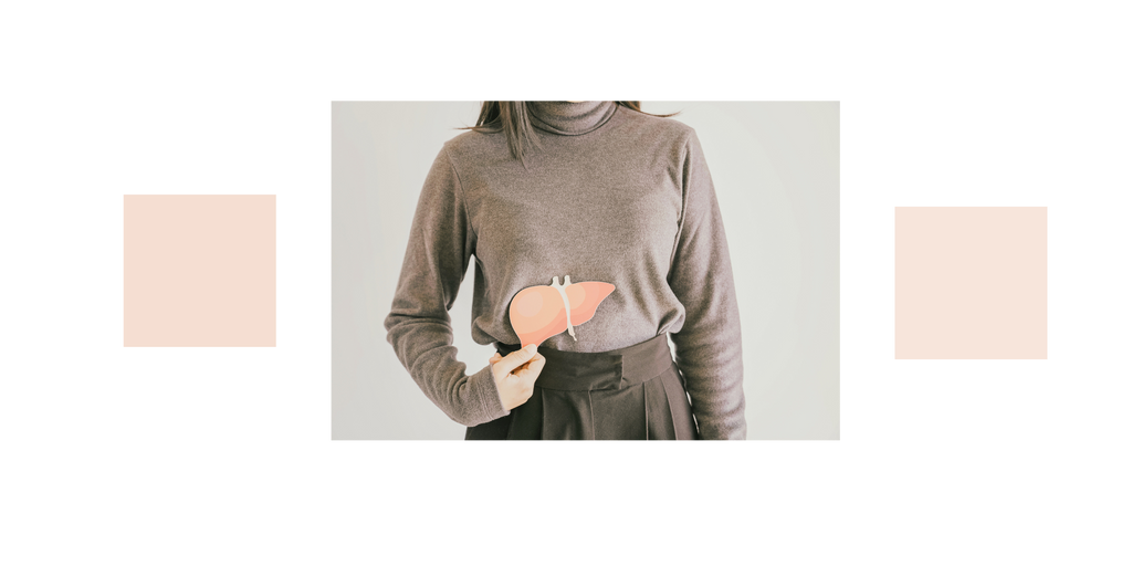 Woman holds up shield, the liver organ is depicted on this