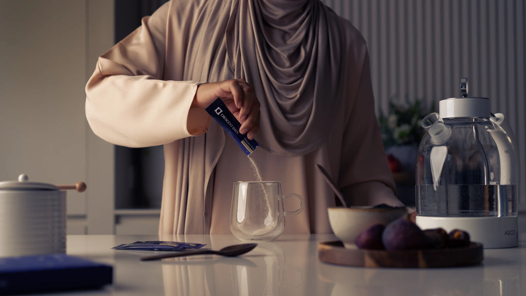 Muslim lady pouring a Dream Stick into a glass