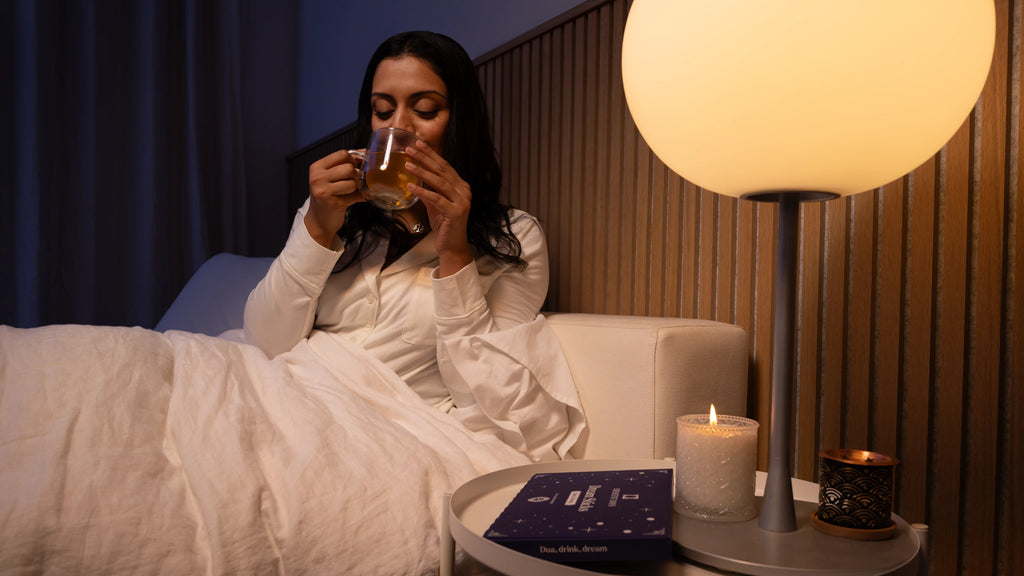 Muslim lady sipping Dream Sticks before bed