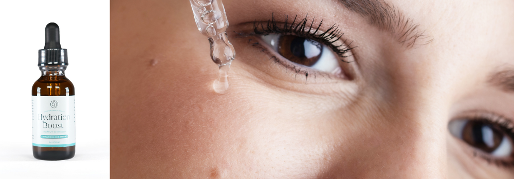 Woman applying Hydration Boost Serum from Mavian Beauty
