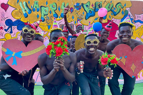 Traditional African dancers performing at a cultural event with SurpriseDance's personalized messages