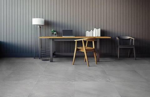 Stone Concept floor tiles used within a dark, minimalist living space.