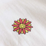 L'icona del fiore, simbolo della t-shirt RISE UP sull'endometriosi