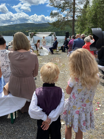 two children watching a Norwegian wedding