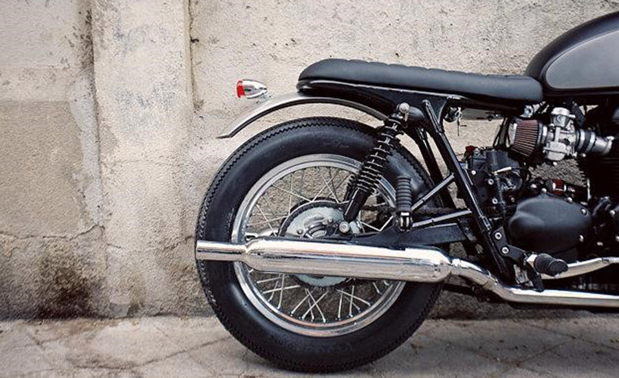 This type of fender is separately attached to the frame of the motorcycle.