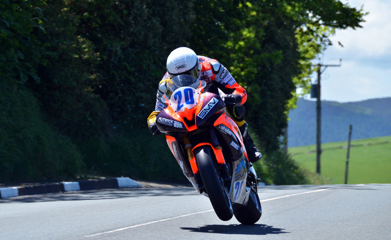 Each year, professional riders race through the roads of the Isle of Man to compete for the Tourist Trophy