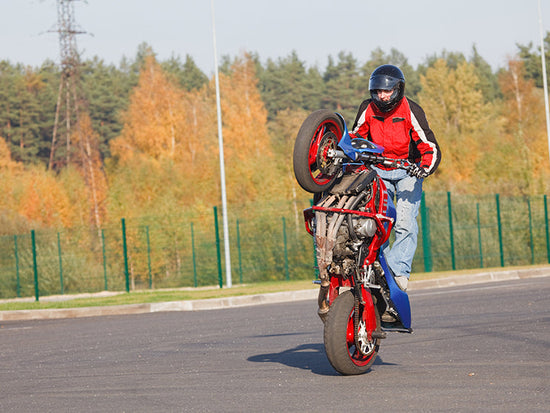 How to Pull 12 O'Clock Wheelies