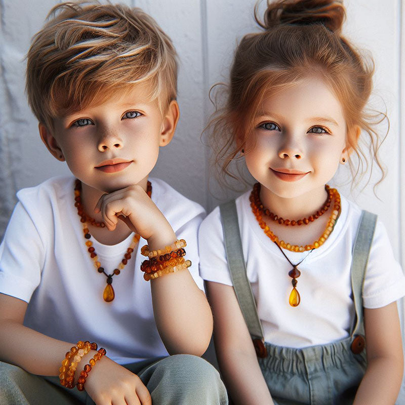 Baltic amber jewelry for children from Lithuania, Latvia, Poland. Amber beads for babies.