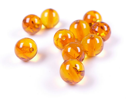Round loose amber beads for jewelry making: Round spheric amber balls in Ø4-Ø12mm.