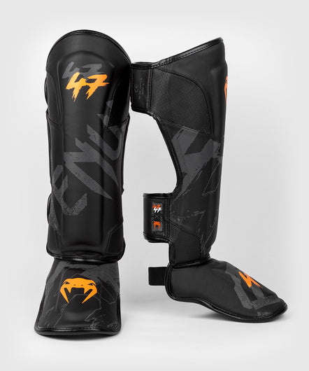 UNBOSTEN Protege Tibia Boxe MMA,Protège Tibia Pied Boxe,Protection idéale  et Ajustement Optimal pour Les Coups de Pied en Combat - Arts Martiaux -  MMA, Kickboxing et Muay Thai-Black and Red