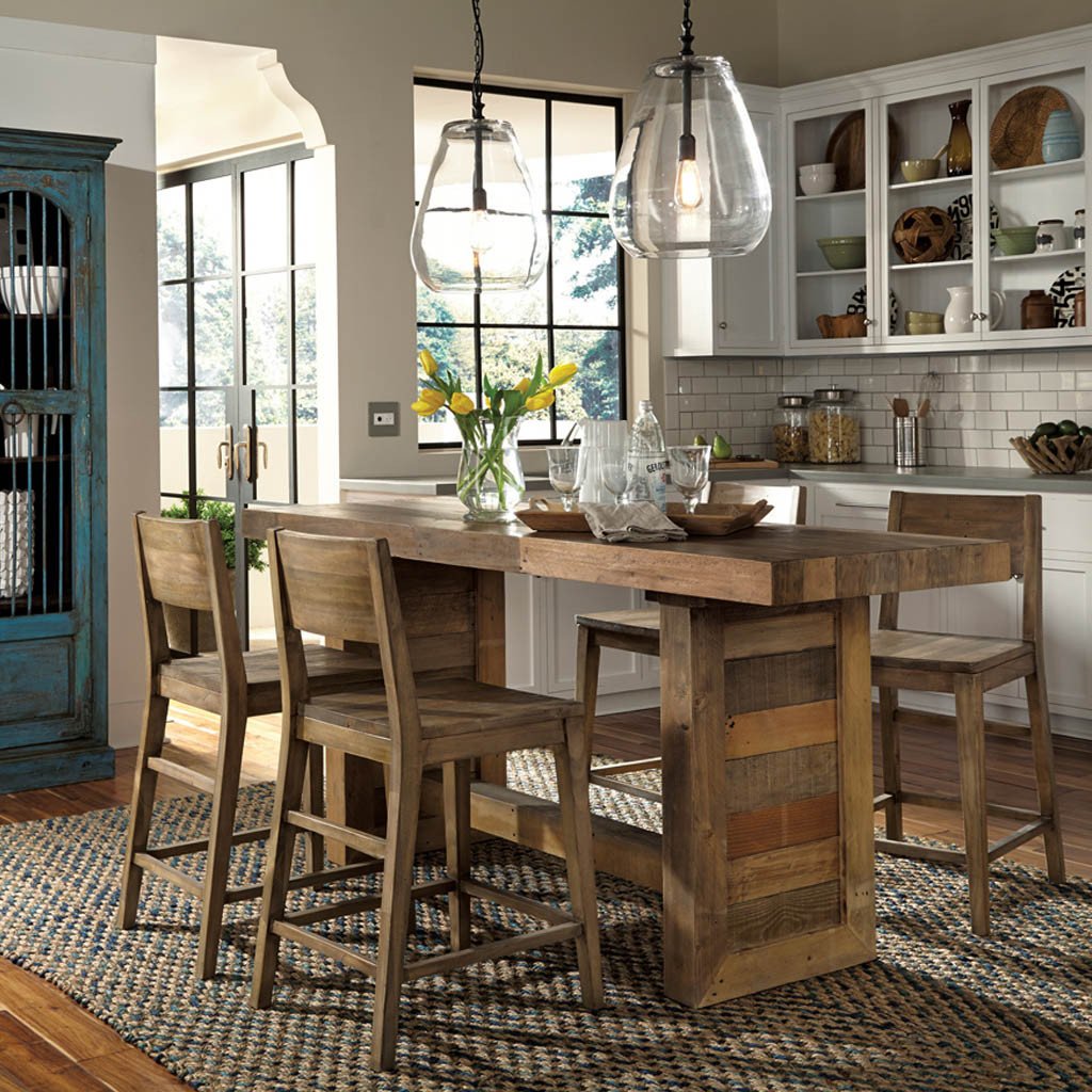 glass pendant lights over dining table