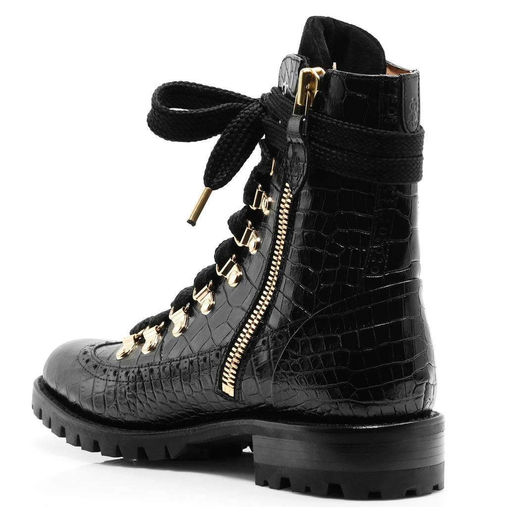 black leather boots with gold hardware