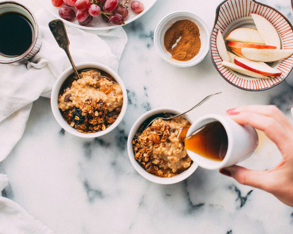 Keto syrup drizzled over breakfast with coffee