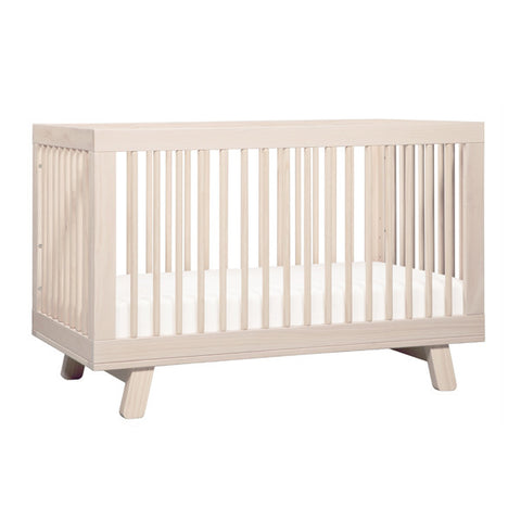 white and timber cot