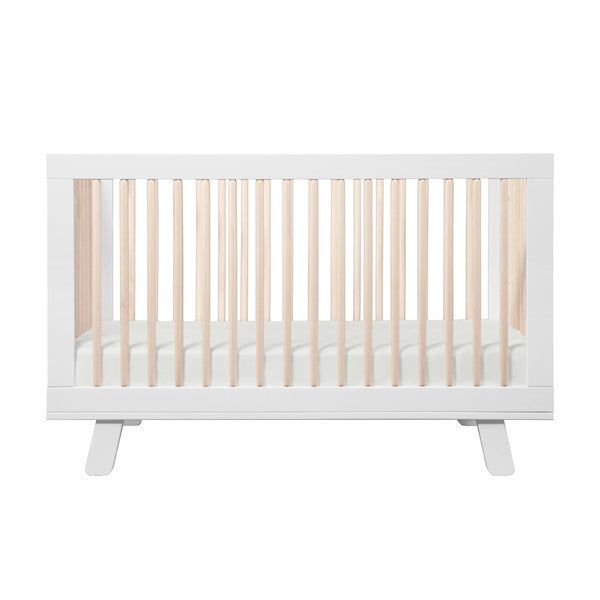 white and timber cot