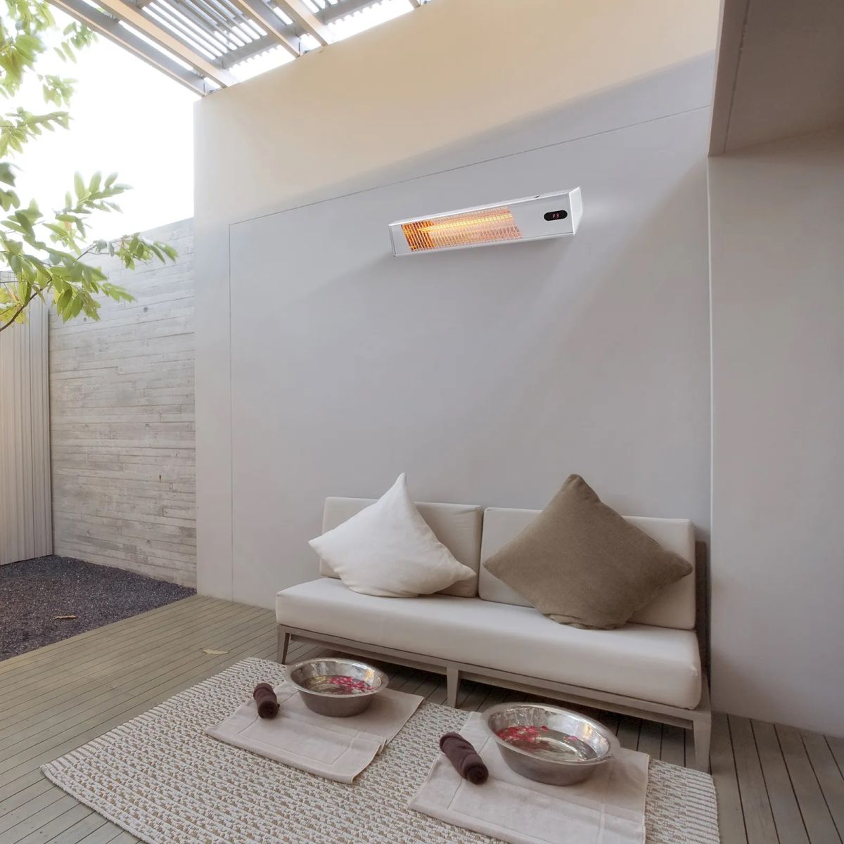This image shows the stylish design of the Excelair EOHA20AR radiant heater mounted in a room