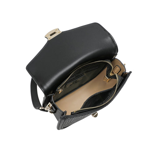 Interior design: Luxury women's handbag from Saga, elegant golden lock process, black color