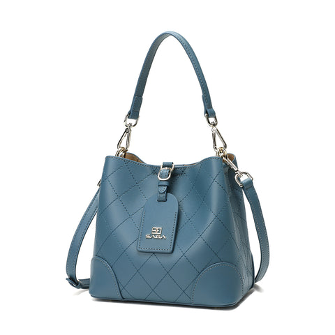 Saga handbag in light blue with an adjustable strap