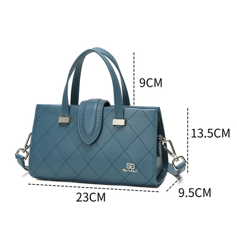 Light blue Saga handbag with clear measurements and detachable strap.