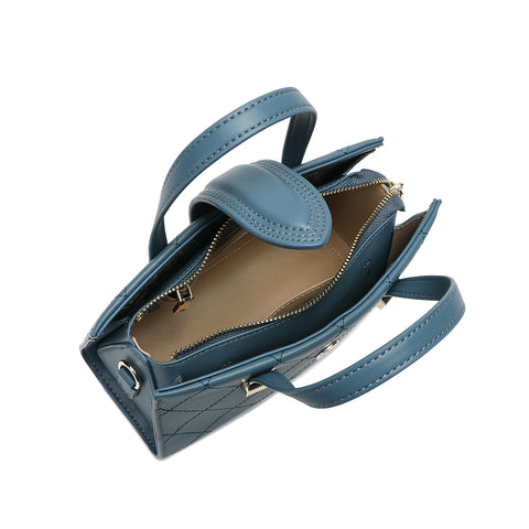 Inside is a light blue Saga handbag with internal pockets and a zipper closure