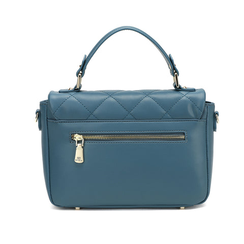 The back side of the Saga handbag is light blue with an external zipper pocket