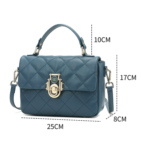 Light blue Saga handbag with statement Dimensions: width 25 cm, height 17 cm, depth 8 cm.