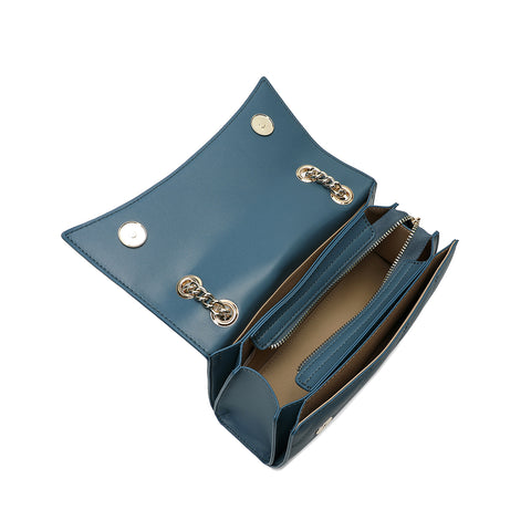 "The interior of this SAGA women's bag is sky blue with multiple pockets and a magnetic closure