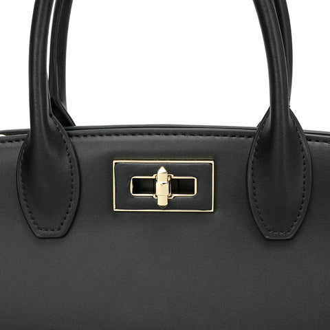Gold metal lock detail on a black leather women's handbag