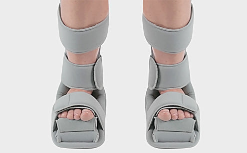 Feet wearing soft night splint