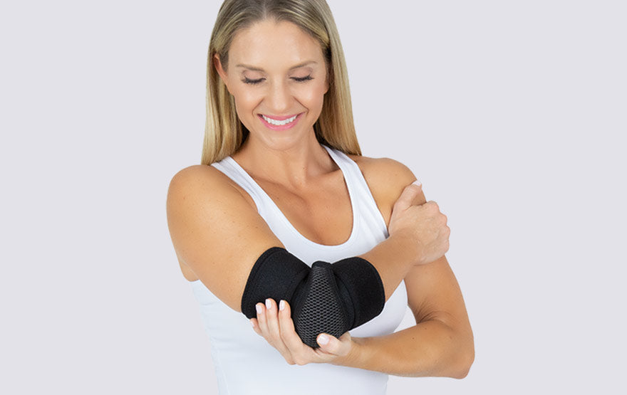 Woman wearing elbow brace