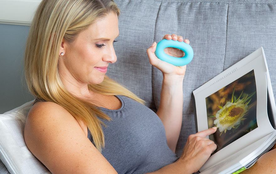 woman using ring grip exercises