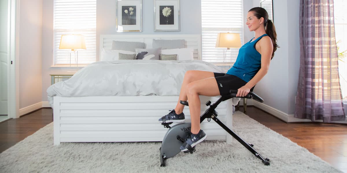 Woman on home cardio machine