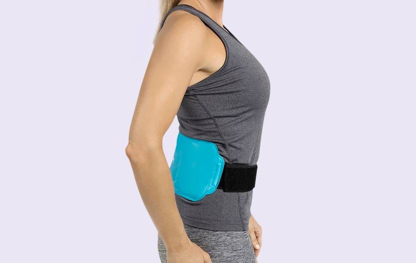 Woman sideview wearing gel ice pack on her lower back