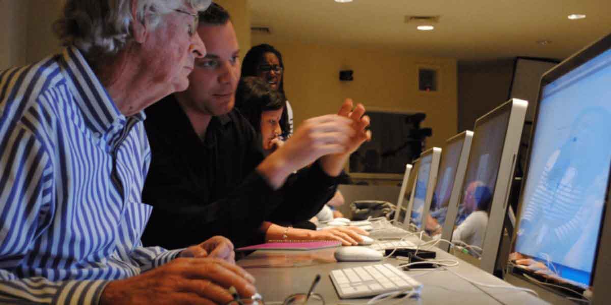 man taking computer class