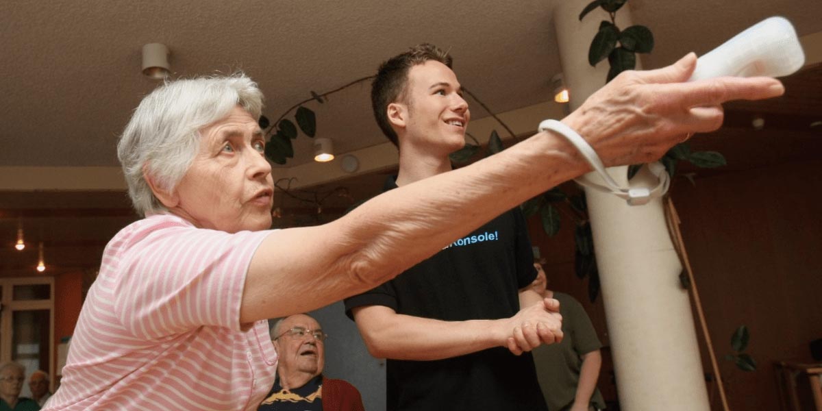 senior woman and man playing the Wii